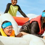 Inflatable Slides Bouncers - Women Having Fun on White Inflatable