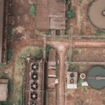 Pool Chemicals - Shabby industrial area with rusty infrastructure