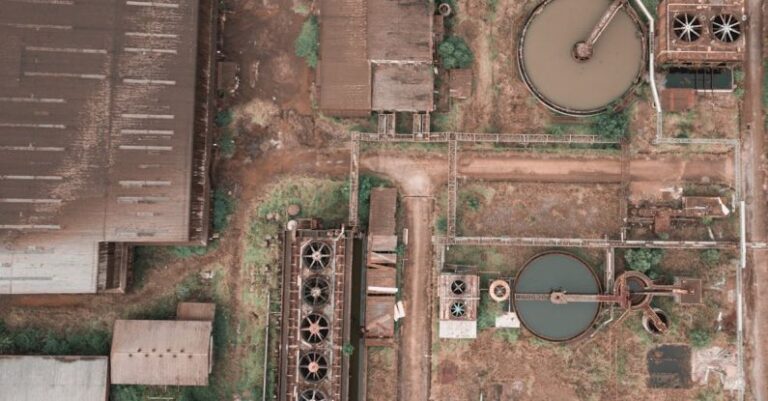 Pool Chemicals - Shabby industrial area with rusty infrastructure