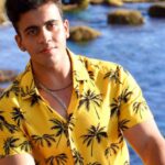 Water Polo Drills - A Man in the Beach Wearing Hawaiian Polo