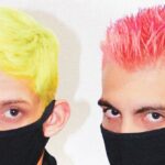 Breath Control - Unrecognizable men with colorful stylish haircuts in medical masks