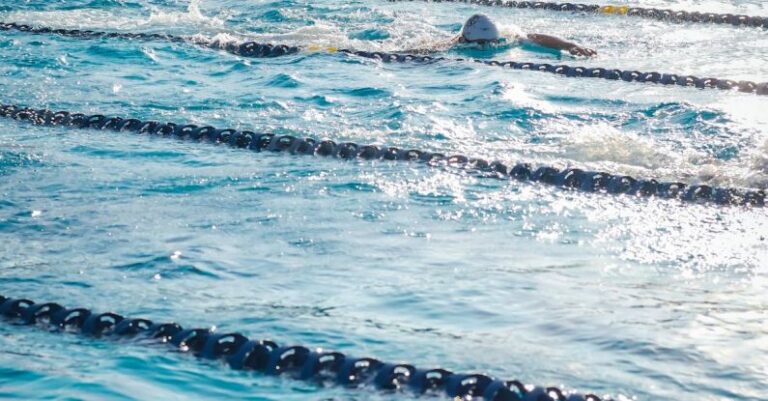 Lap Swimming - People Swimming in the Pool
