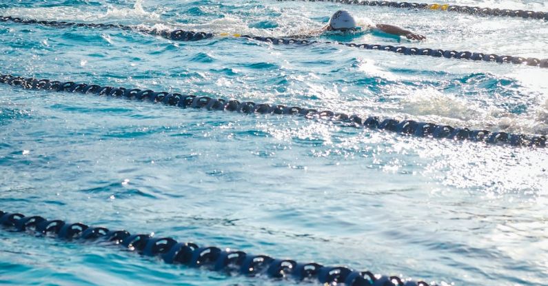 Lap Swimming - People Swimming in the Pool
