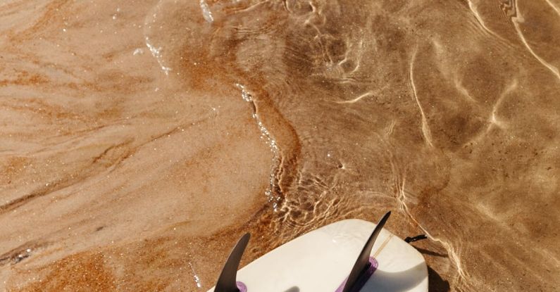 Kickboards Fins - Surfboard with Fins on the Beach by the Water