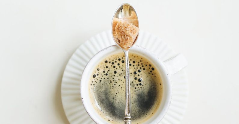 Cardiovascular Health - Cup Of Coffee With Saucer And Teaspoon