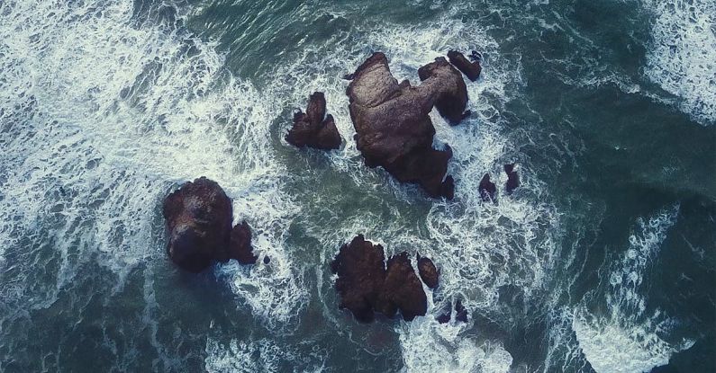 High-Platform Diving - Splashing Wave on Rock