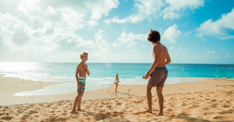 Sandy Beach - Group of People on Brown Sand