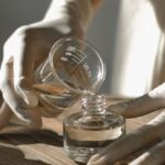 Chemical Sunscreens - Crop black woman making aromatic liquid incense
