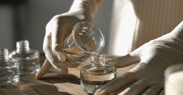 Chemical Sunscreens - Crop black woman making aromatic liquid incense