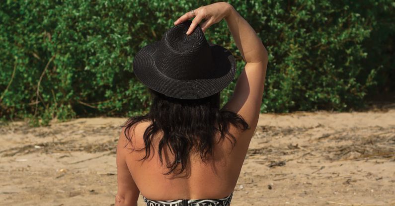 Tanning Practices - Girl in beach