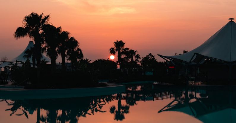 Evening Swims - Golden Sunset Reflection in a Pool