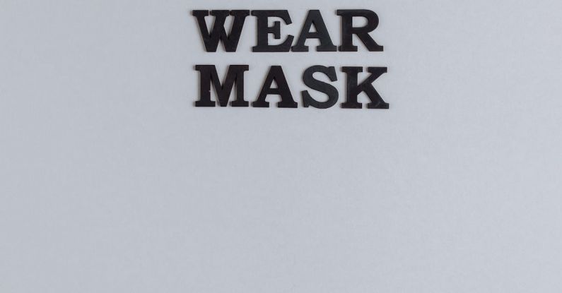 Safety Precautions - Wear Mask Slogan On Gray Background