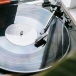 Music Playlists - Vintage record player with disc placed on windowsill